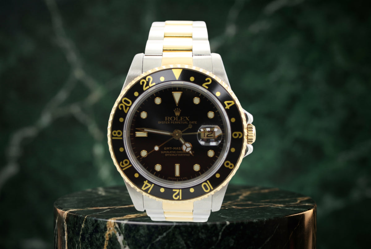 1993 Rolex GMT-Master II Black Two-Tone 16713 40mm Oyster Watch With RSC Box and Papers SKU: JNAGG0726746