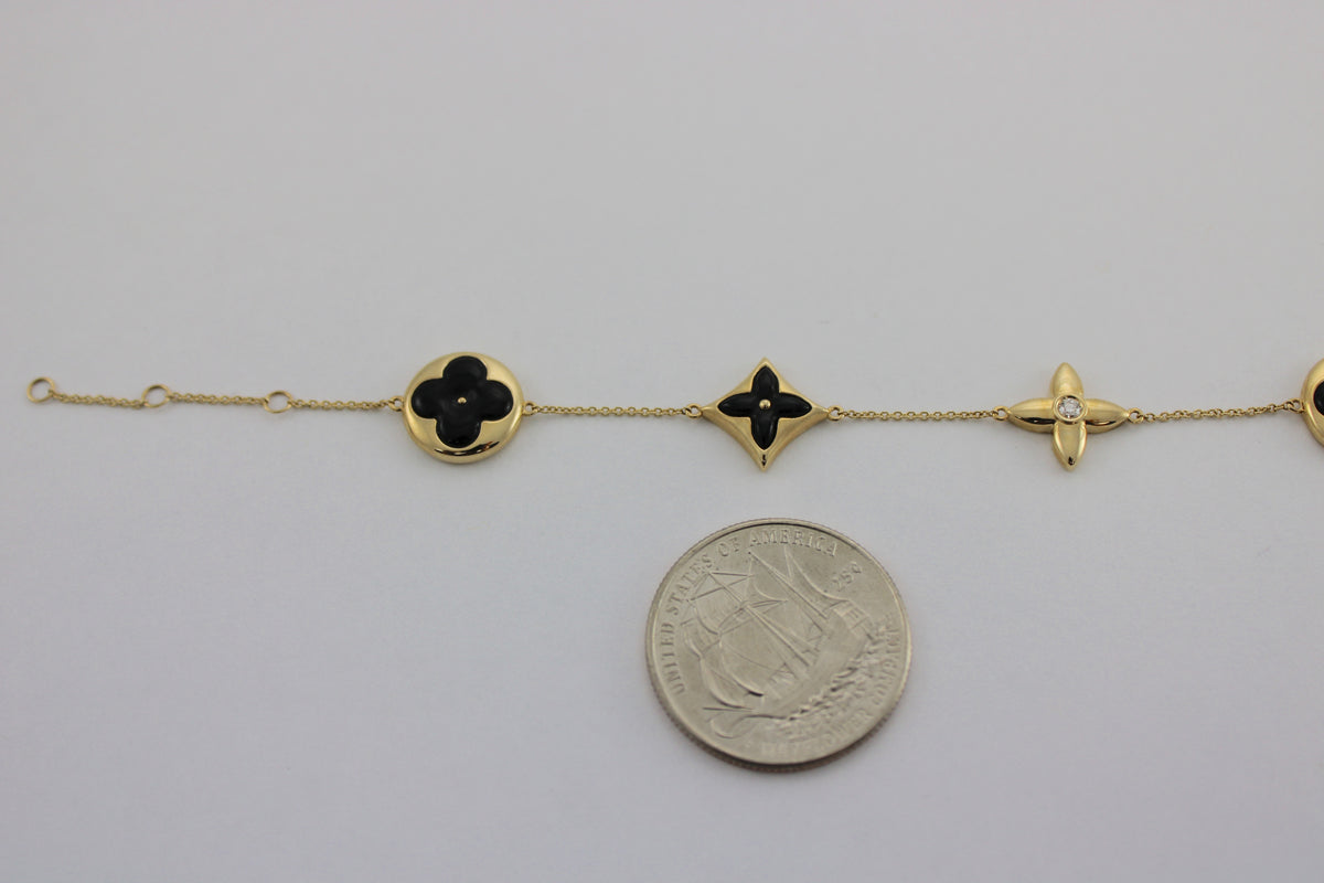 0.06 Carat Diamond 4 Station Black Onyx 14K Yellow Gold Bracelet