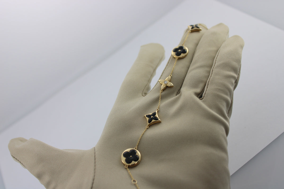 0.06 Carat Diamond 4 Station Black Onyx 14K Yellow Gold Bracelet