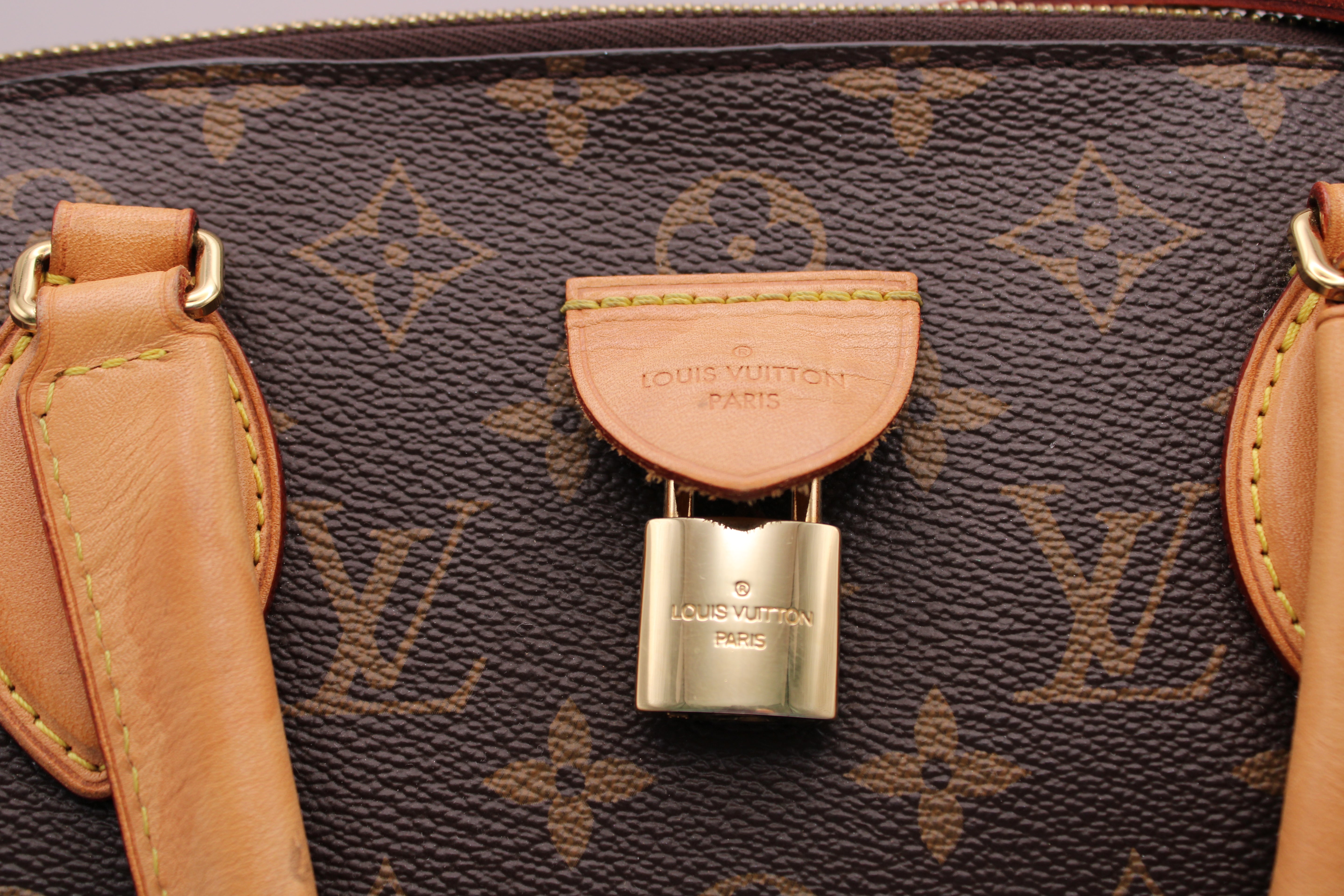 Louis Vuitton Rivoli Handbag Monogram Canvas MM M44546