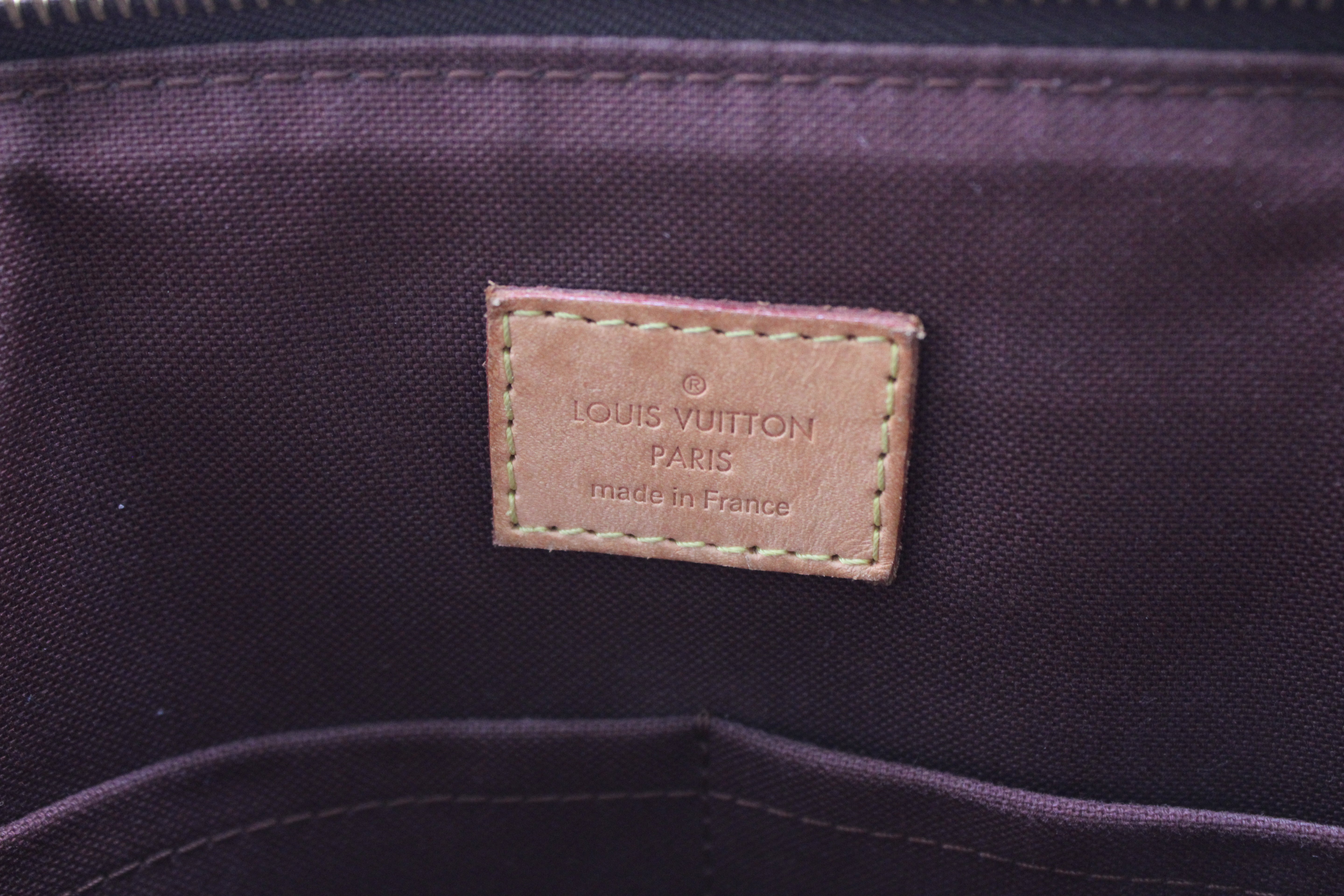 Louis Vuitton Rivoli Handbag Monogram Canvas MM M44546