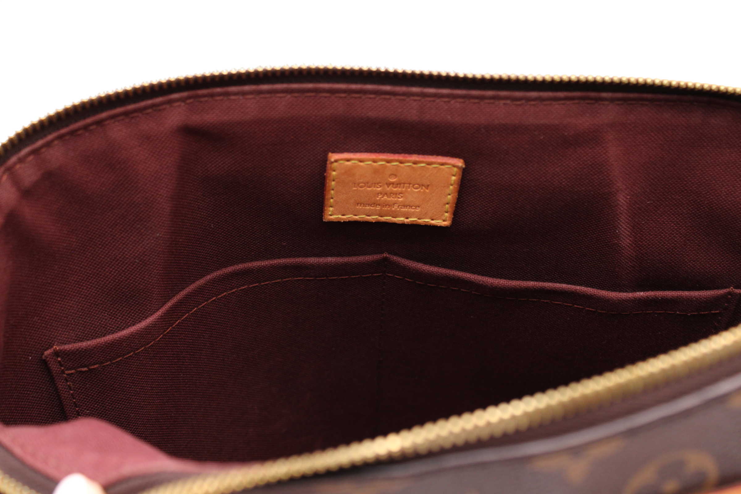 Louis Vuitton Rivoli Handbag Monogram Canvas MM M44546