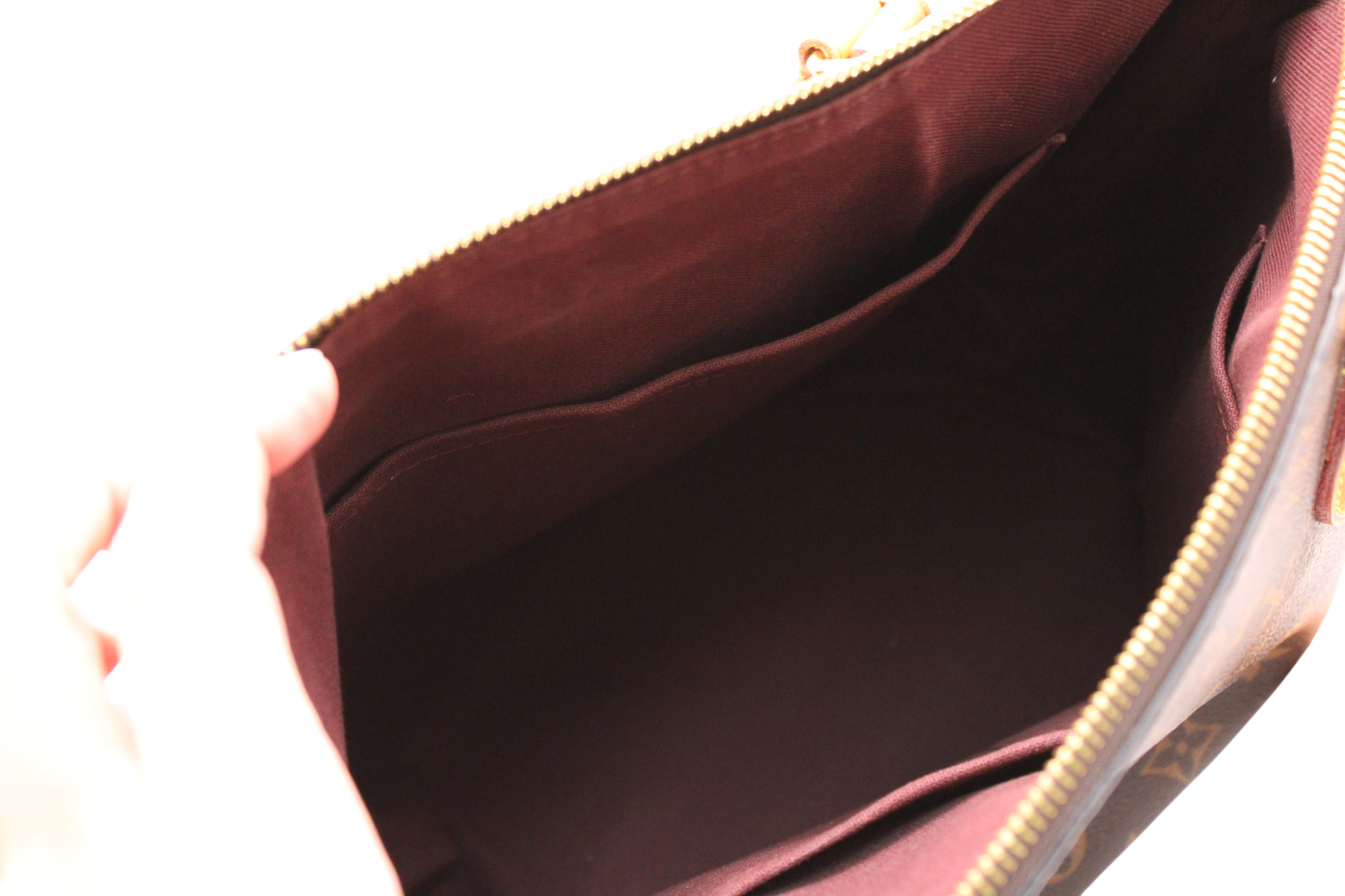 Louis Vuitton Rivoli Handbag Monogram Canvas MM M44546