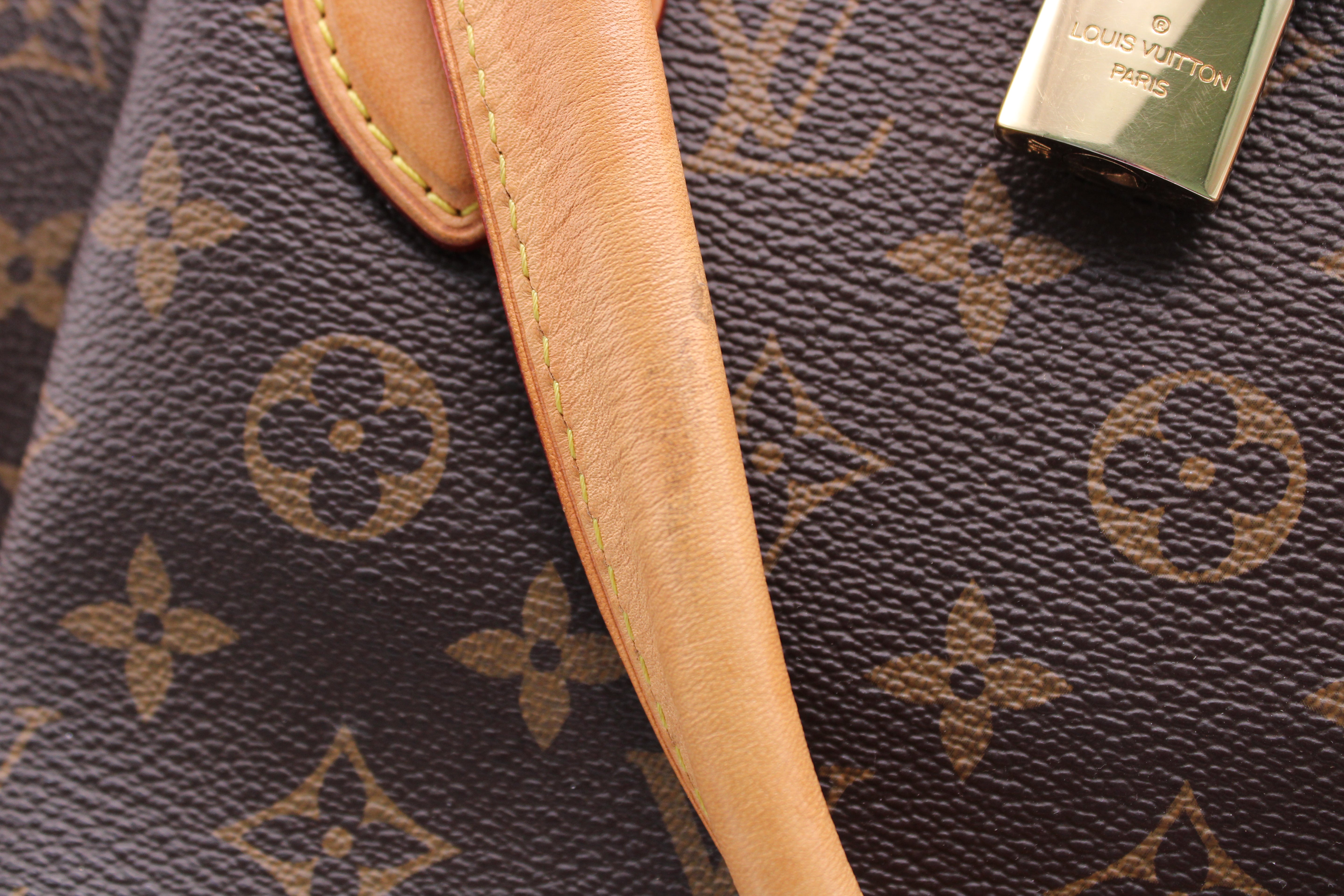 Louis Vuitton Rivoli Handbag Monogram Canvas MM M44546