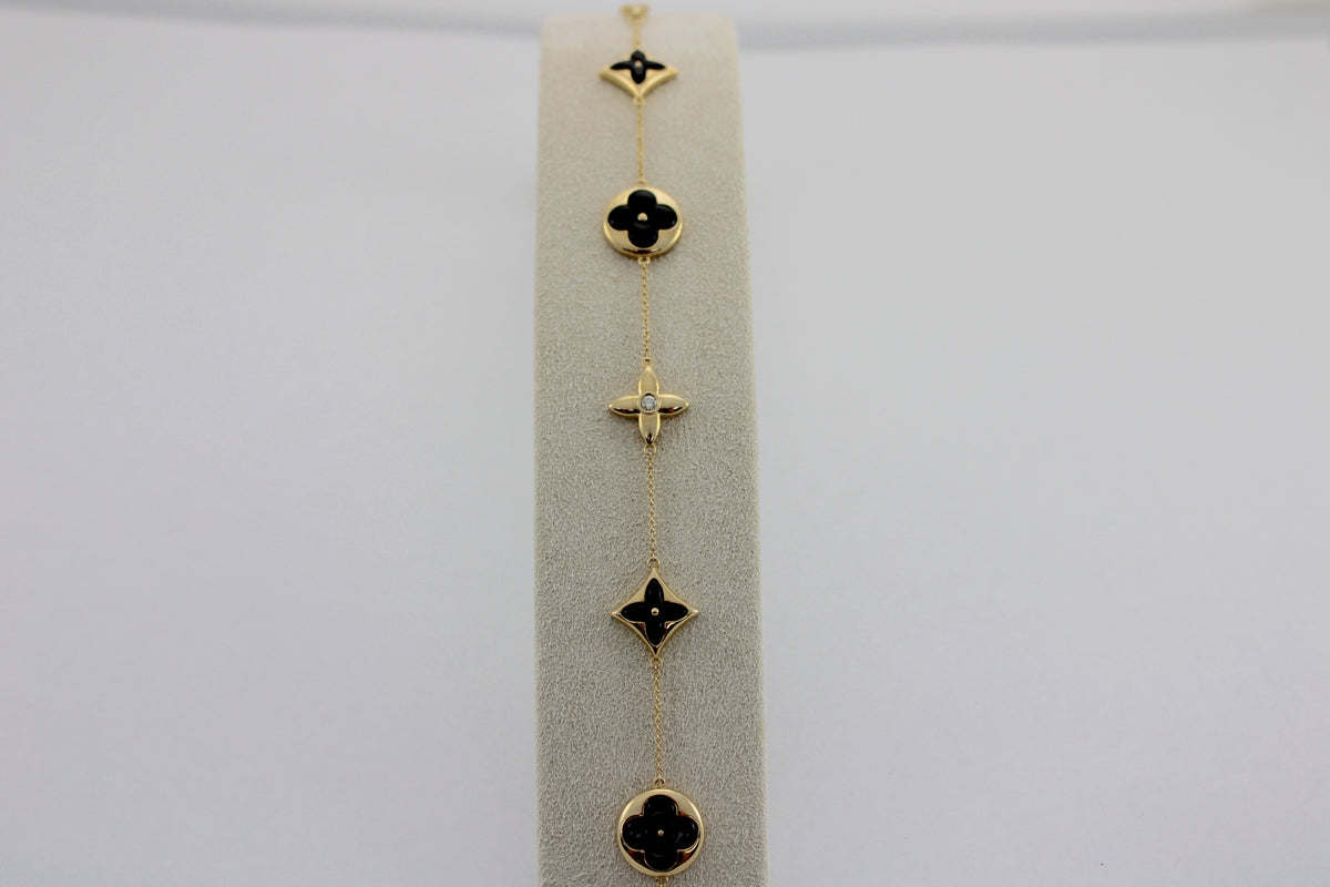 0.06 Carat Diamond 4 Station Black Onyx 14K Yellow Gold Bracelet